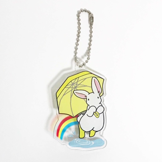 透けて虹がかかる 傘ジャンプのアクリルキーホルダー