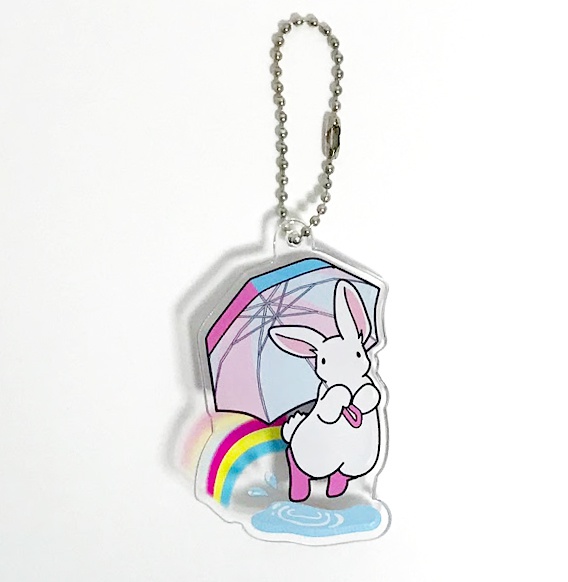 透けて虹がかかる 傘ジャンプのアクリルキーホルダー
