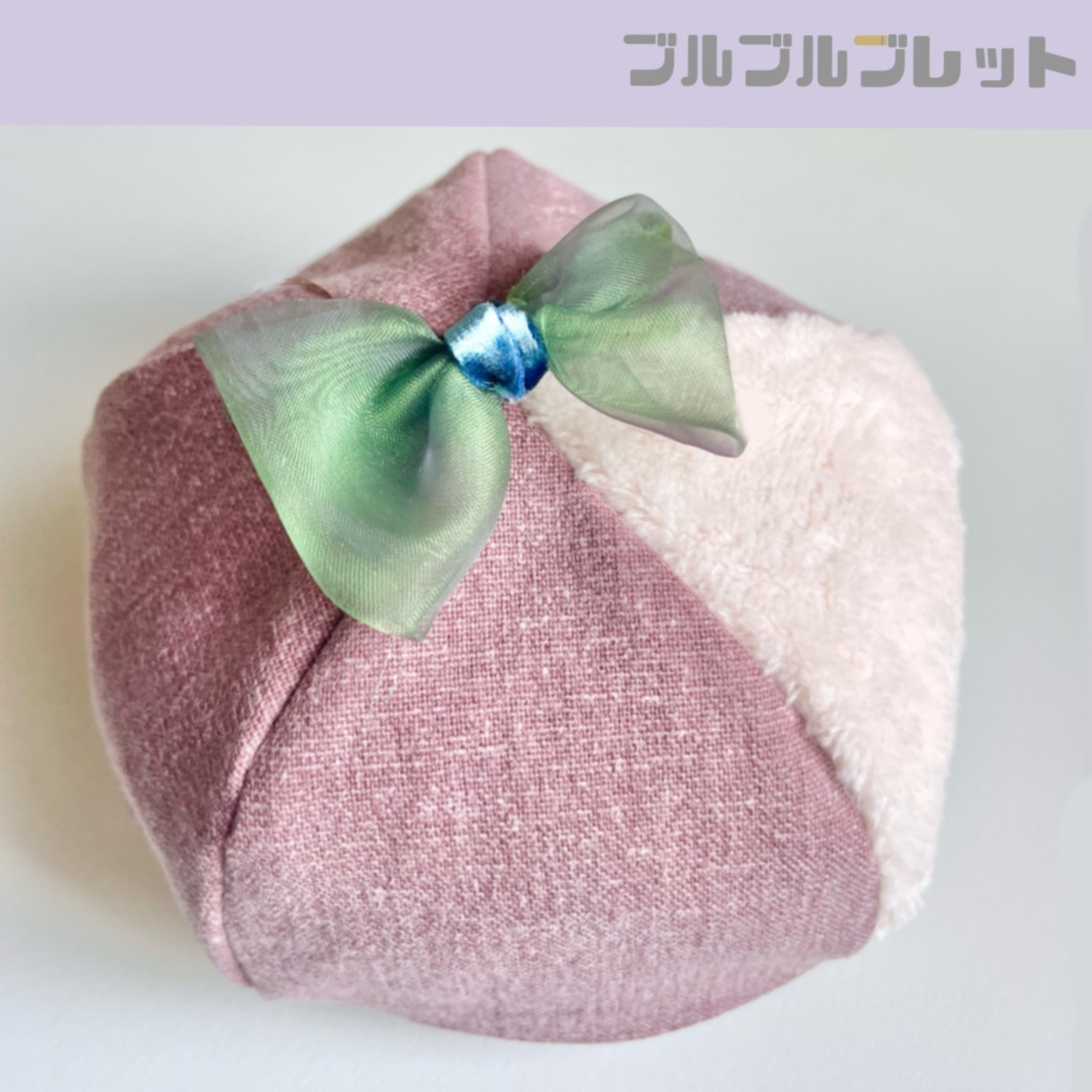 花に伴うテデ帽子