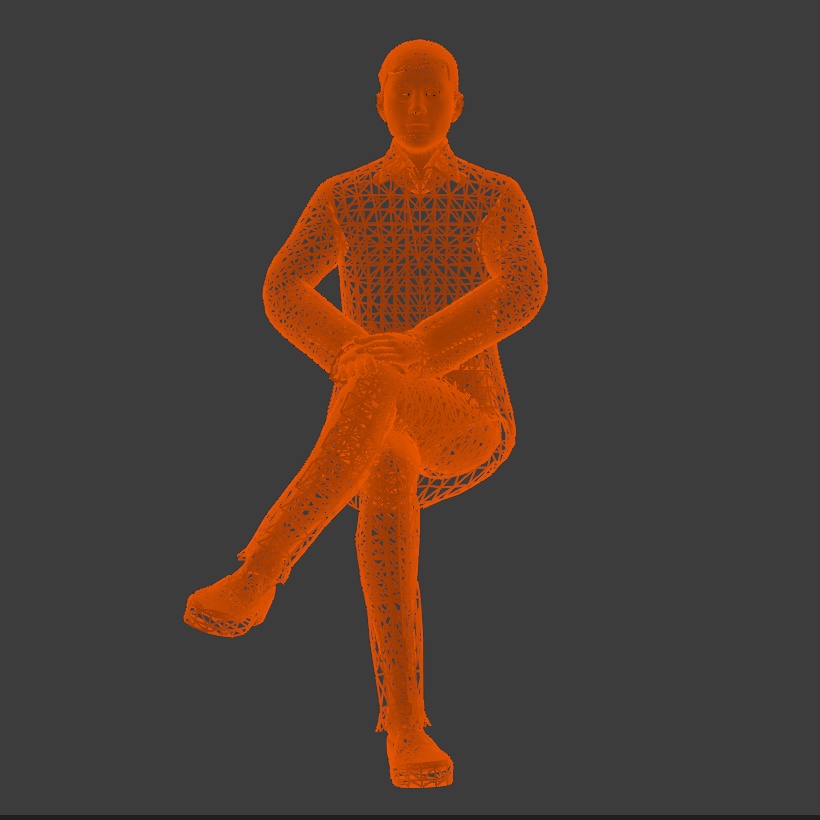 脚組して座る男