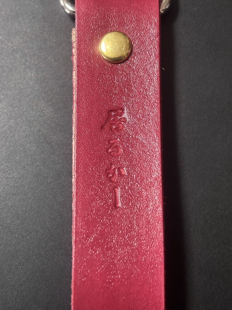 地に落ちキーホルダー(叔父さん)