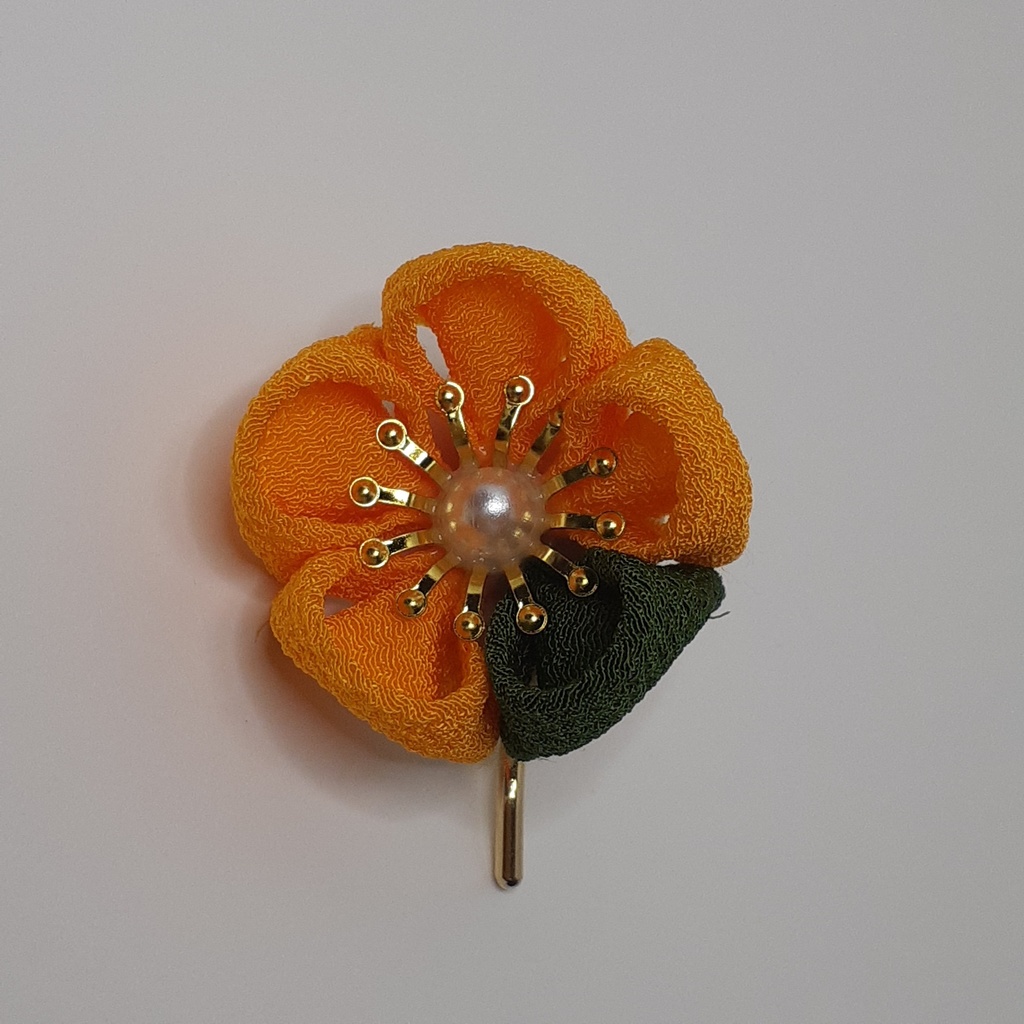 つまみ細工ポニーフック　橙色と緑色