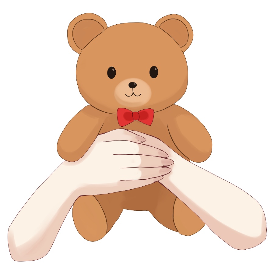 くまさんをぎゅっと抱っこしてる手