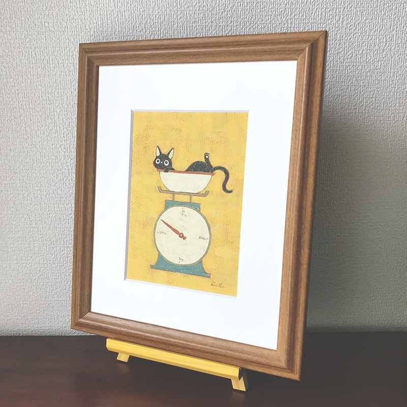 「子ねこの体重測定」