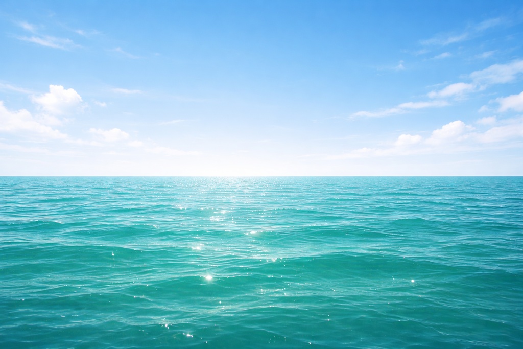 エメラルドグリーンの海と青空のシンプル夏背景 16:9 南国風海素材