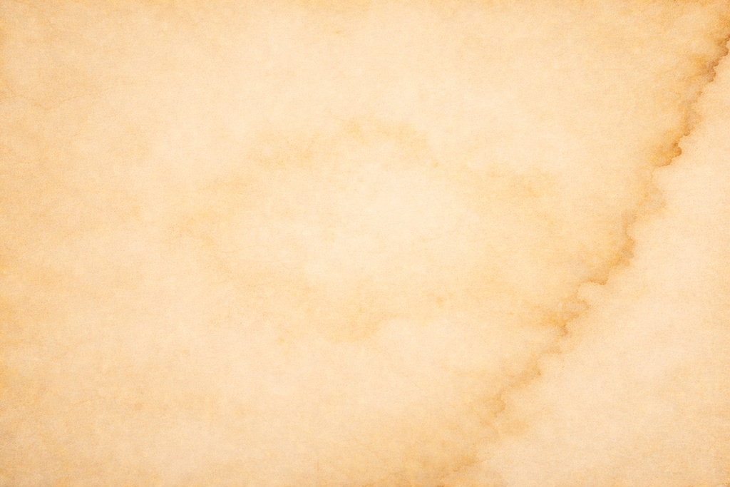 中心に残る焼け痕｜痕跡表現羊皮紙背景（16:9 高精細）