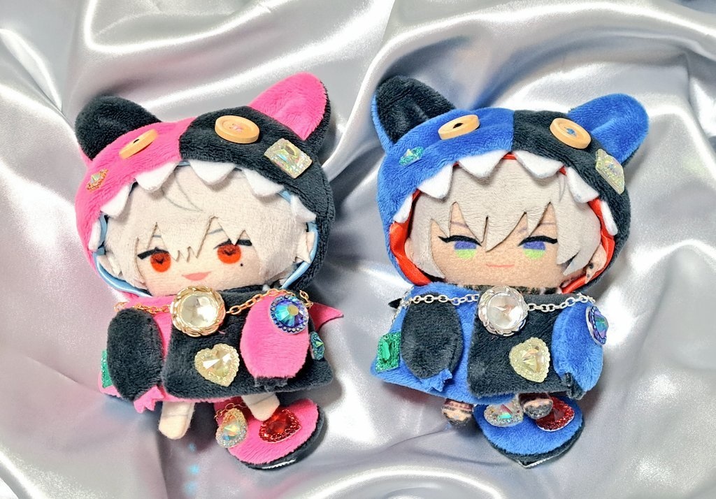 ギラギラなネコチャンフード付きポンチョ