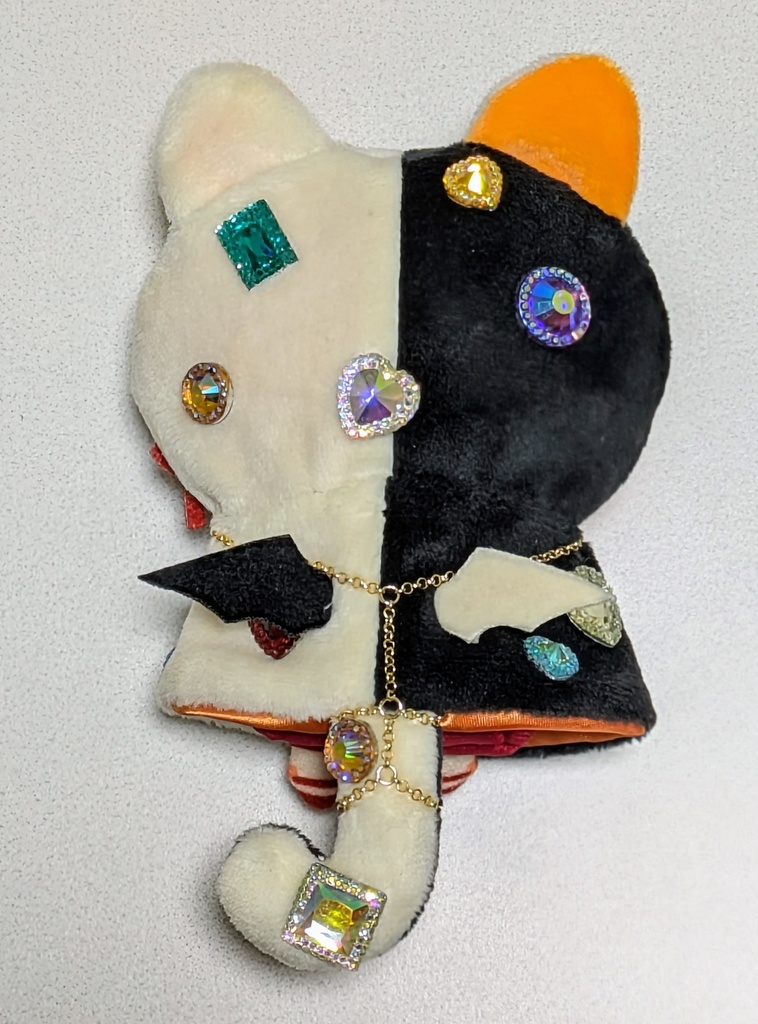 ギラギラなネコチャンフード付きポンチョ