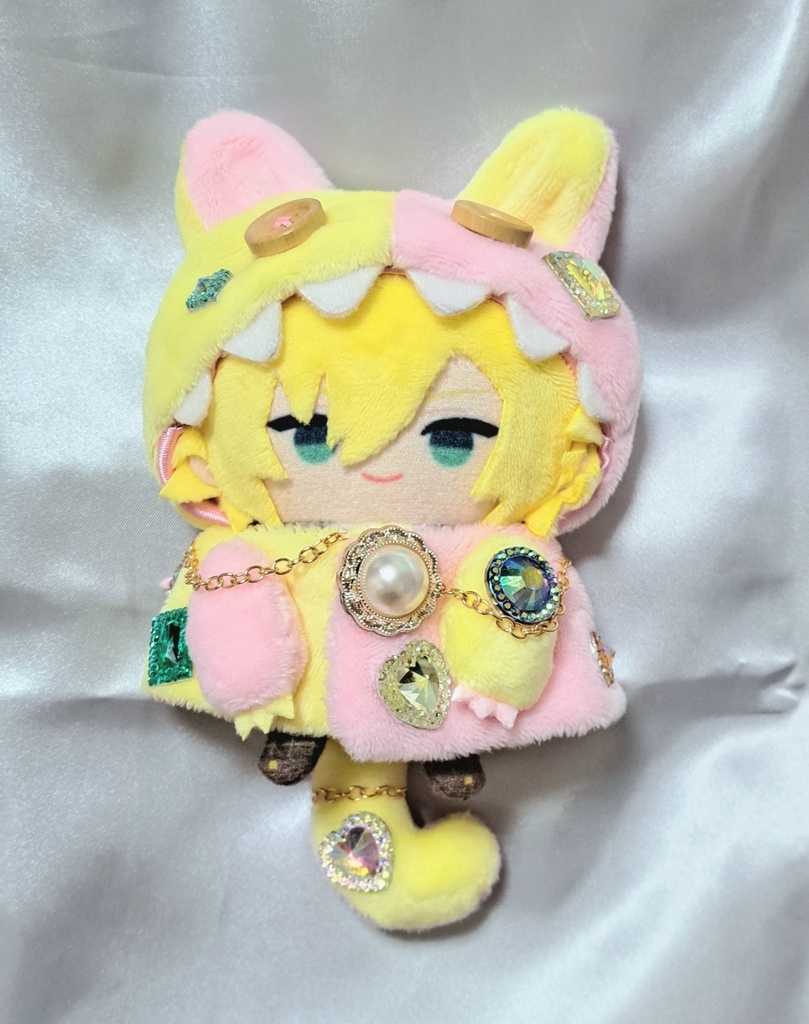 ギラギラなネコチャンフード付きポンチョ