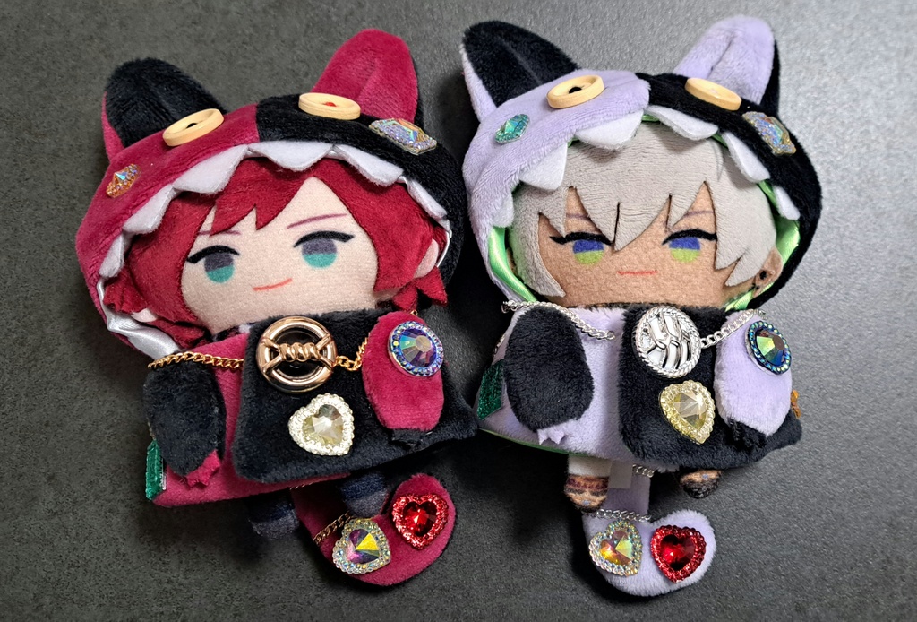 ギラギラなネコチャンフード付きポンチョ