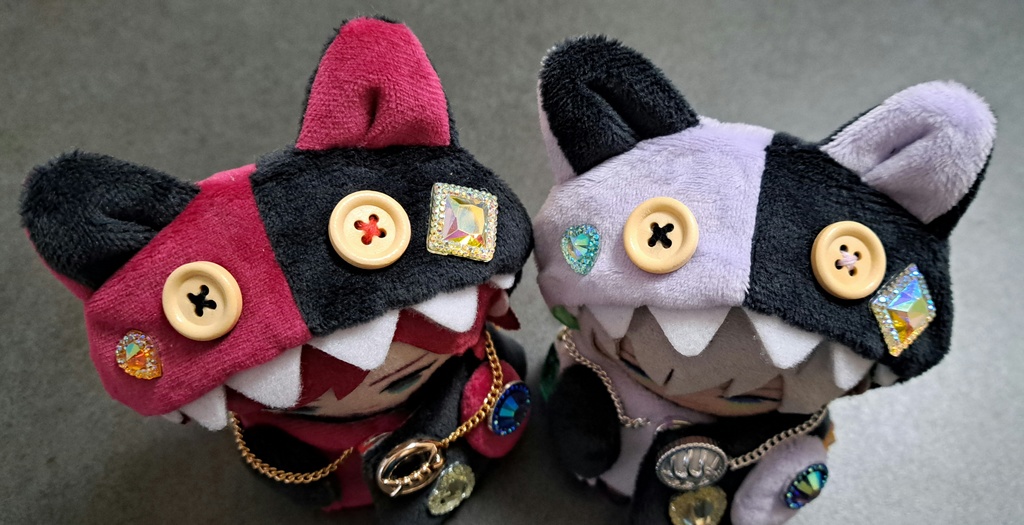 ギラギラなネコチャンフード付きポンチョ