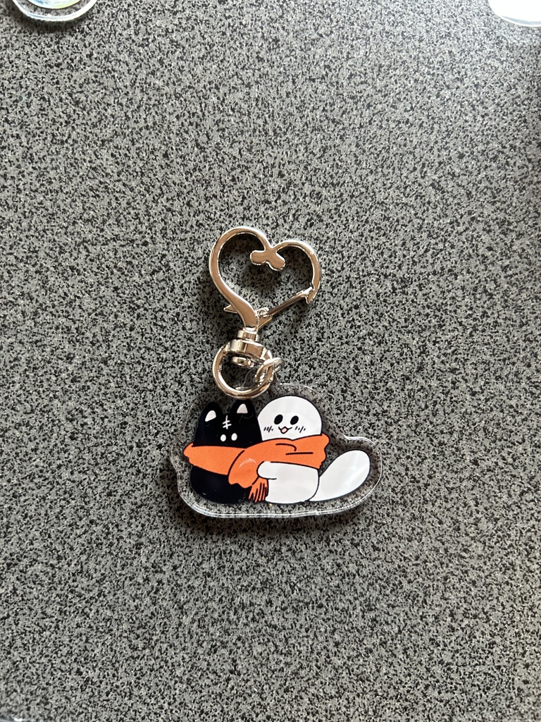 みみのないねこのアクリルキーホルダー