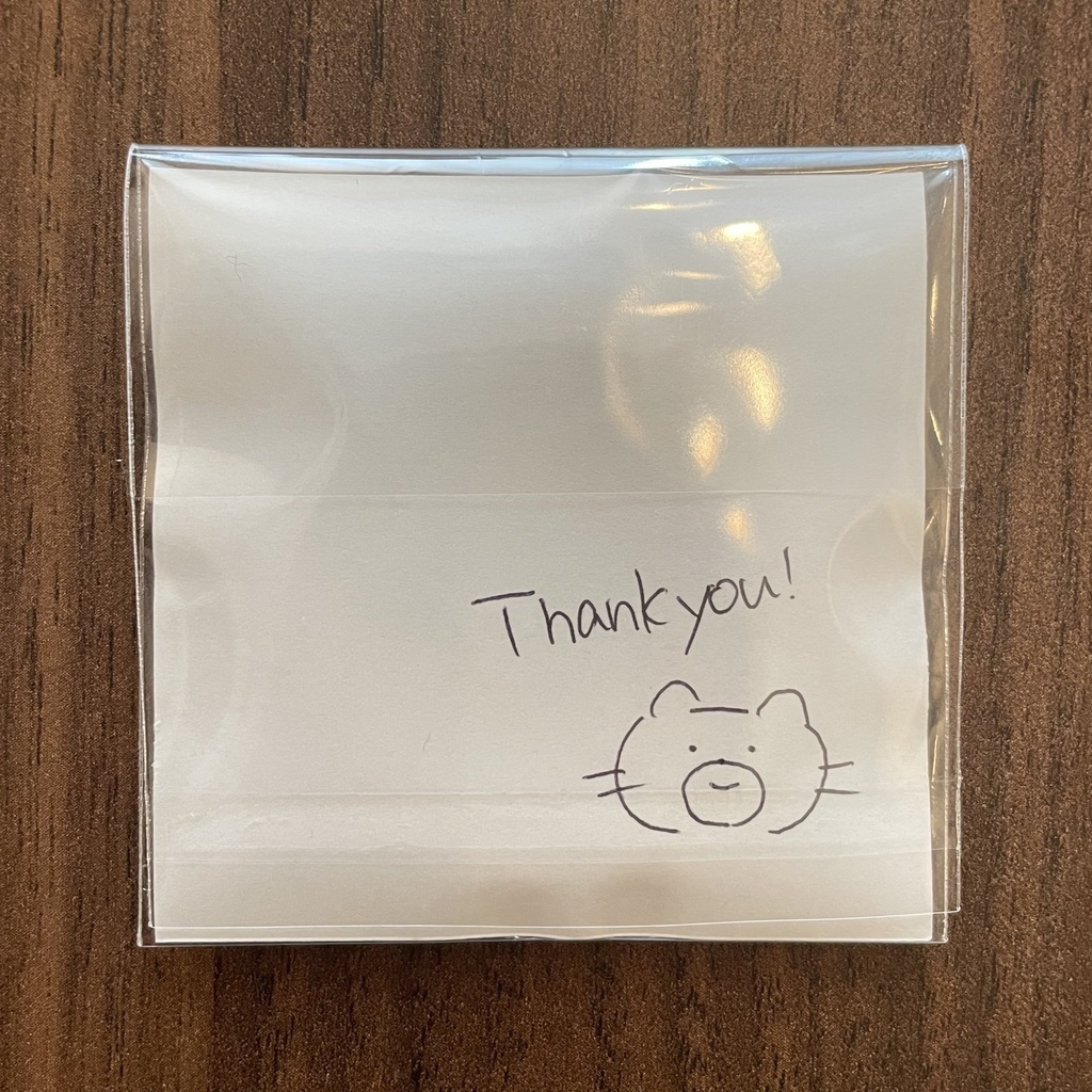 ねこぐま丸型缶バッジ【泣き】