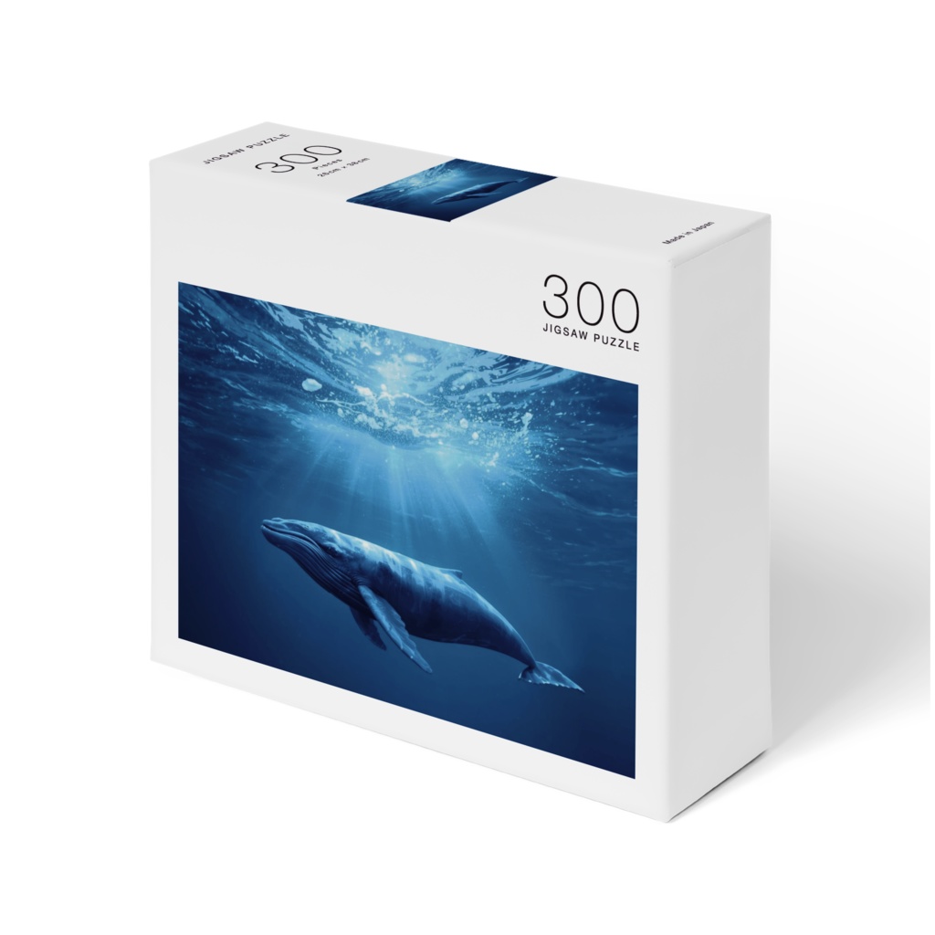 光射す海とクジラ