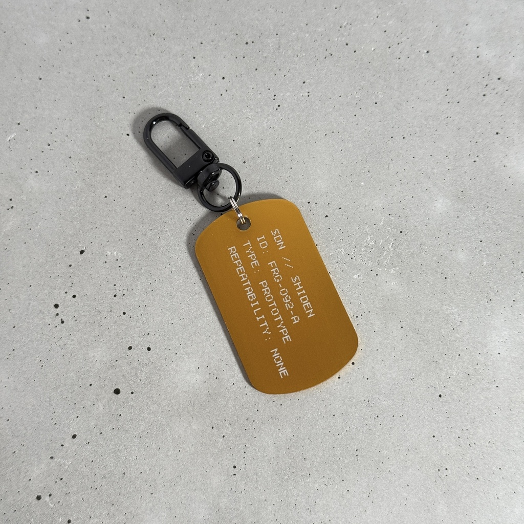 THUNDER BOLT V2 LOGO DOGTAG KEY CHARM ORANGE