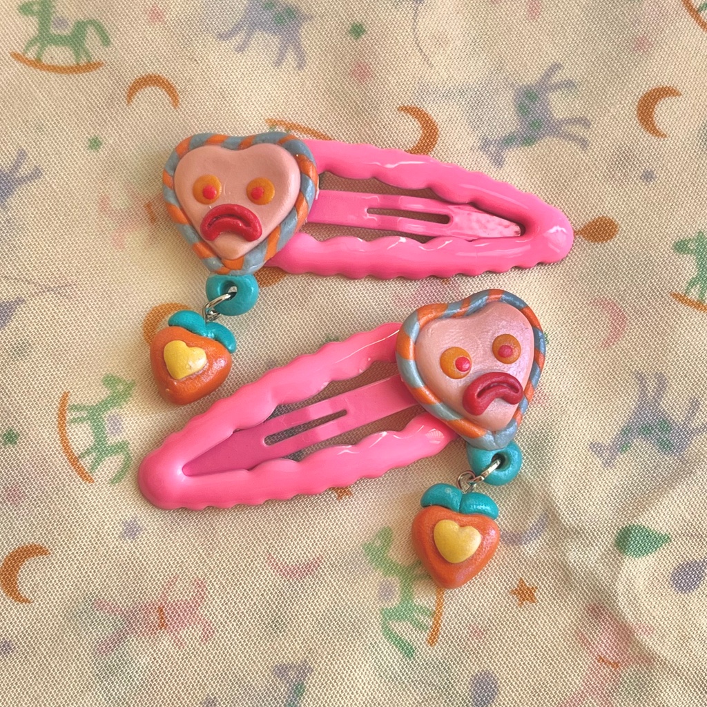 ゆらゆらぱっちんピン-ぷんぷん顔