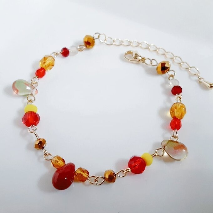 しずくとガラスビーズの秋色レッドトパーズのグラデーション風ブレスレット