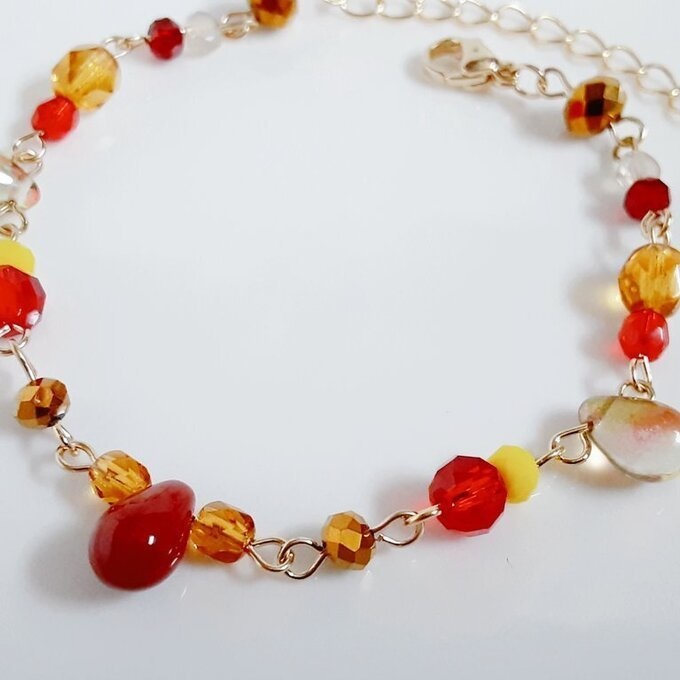 しずくとガラスビーズの秋色レッドトパーズのグラデーション風ブレスレット