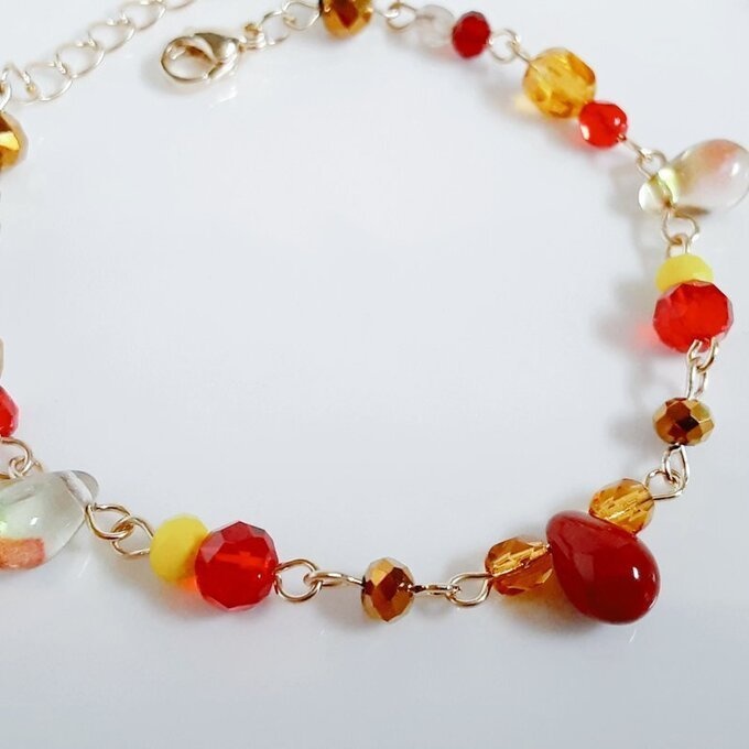 しずくとガラスビーズの秋色レッドトパーズのグラデーション風ブレスレット