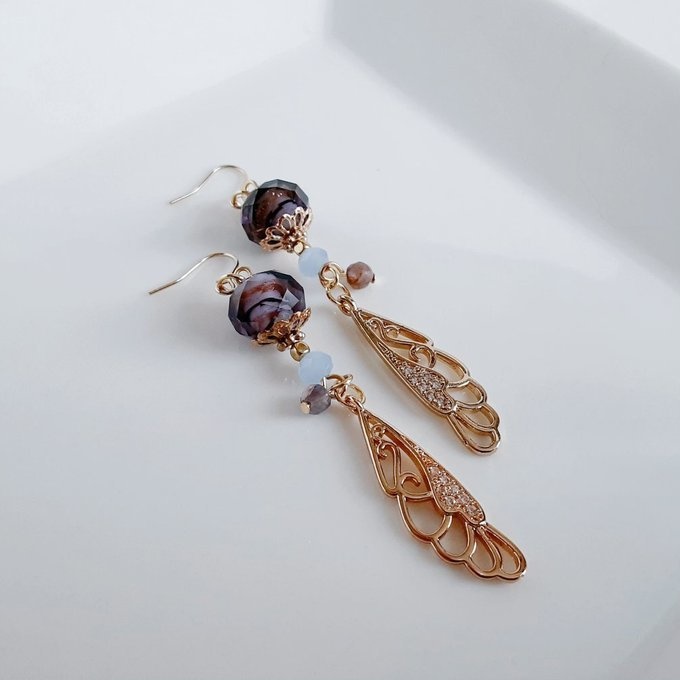 1ペアのみ☆まるで蝶の羽のようなジルコニアチャームととんぼ玉ビーズが綺麗なピアス/イヤリング(紫)