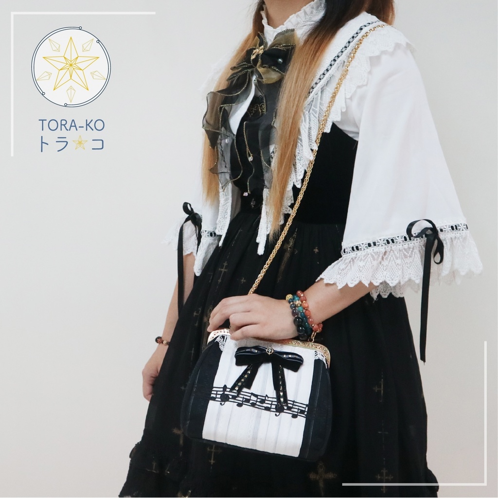 【トラコ】がま口ポーチ ピアニストのささやき