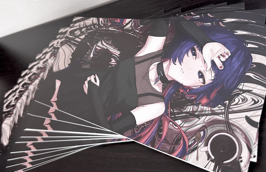 理芽　大判ポストカード　『官能と飽食』