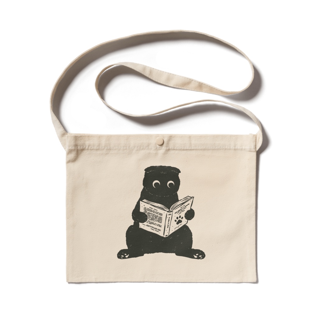 スコ座りで読書(スコティッシュフォールド)