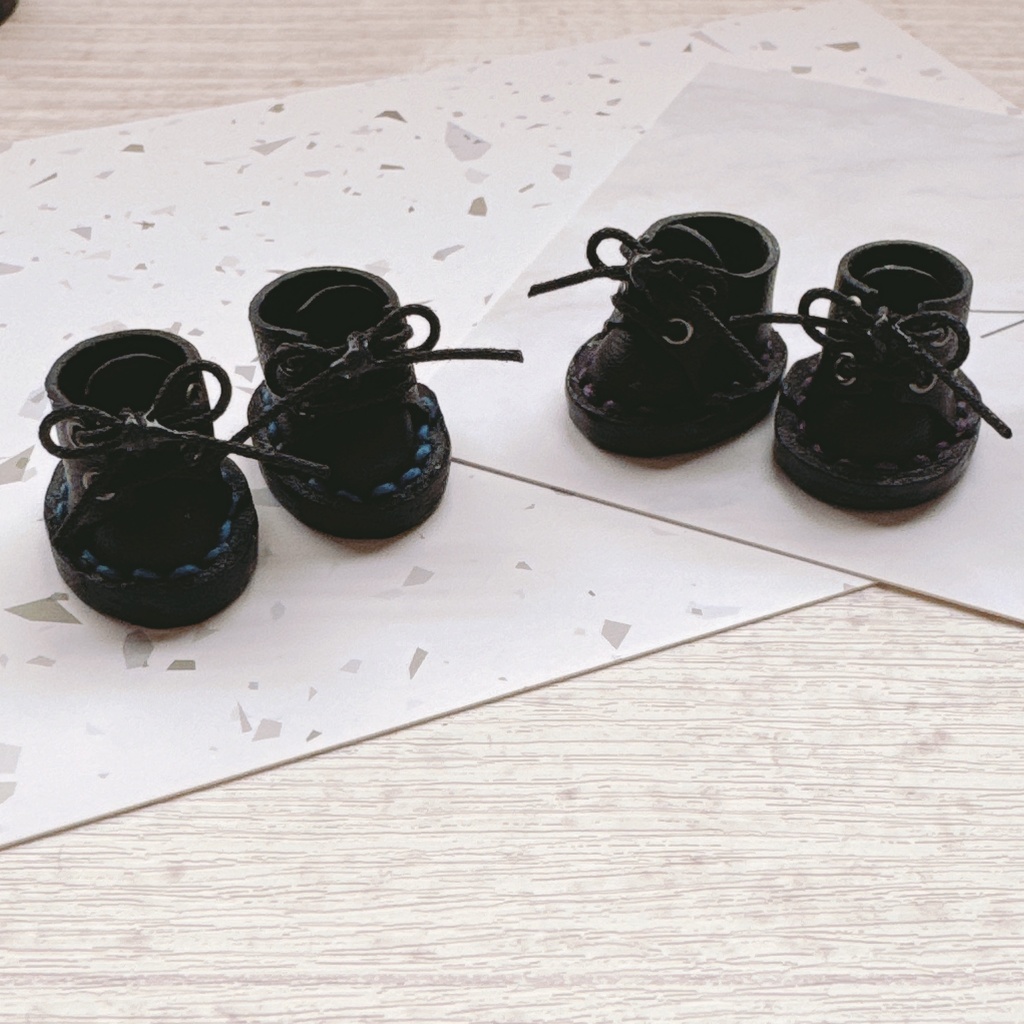 Black shoes with color stitching