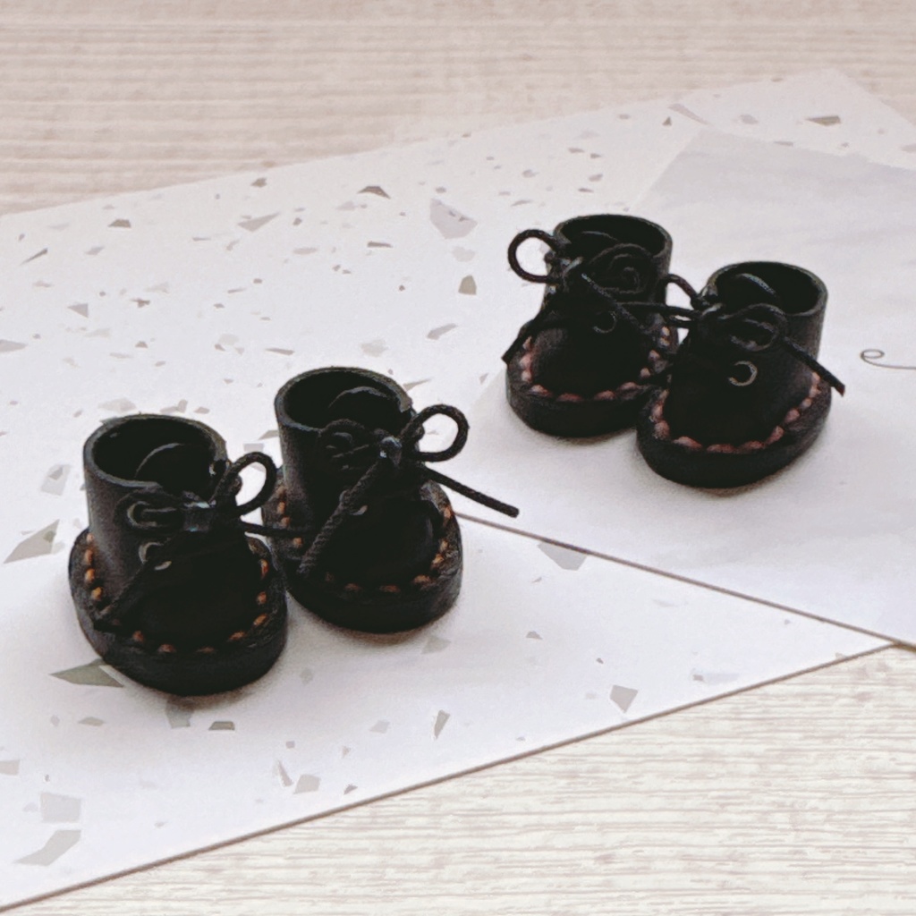 Black shoes with color stitching