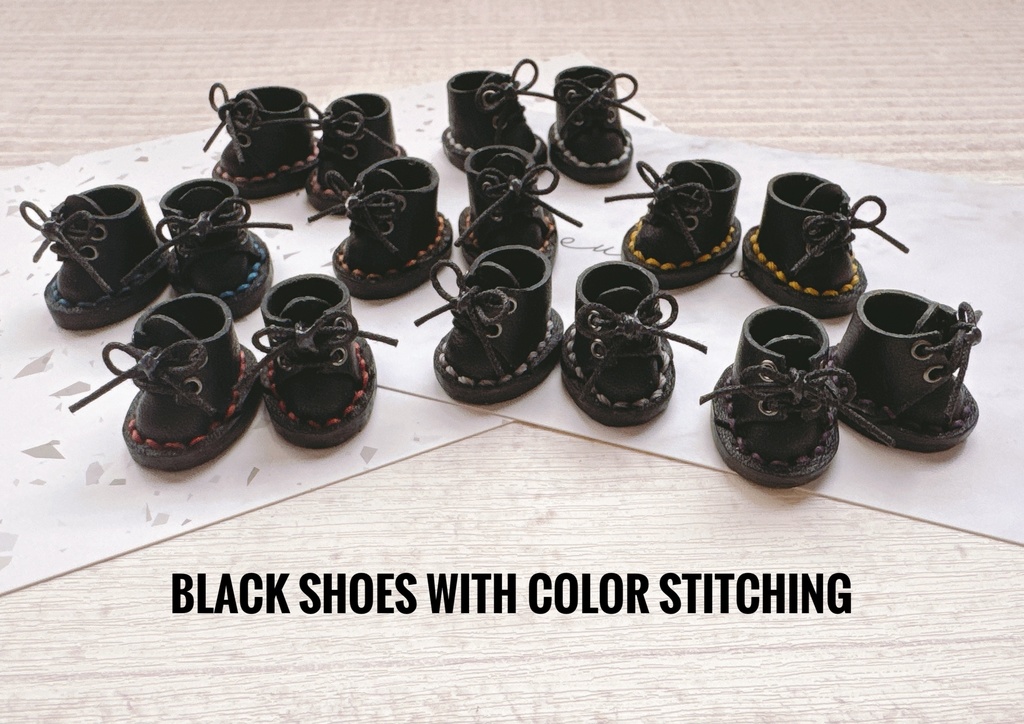 Black shoes with color stitching