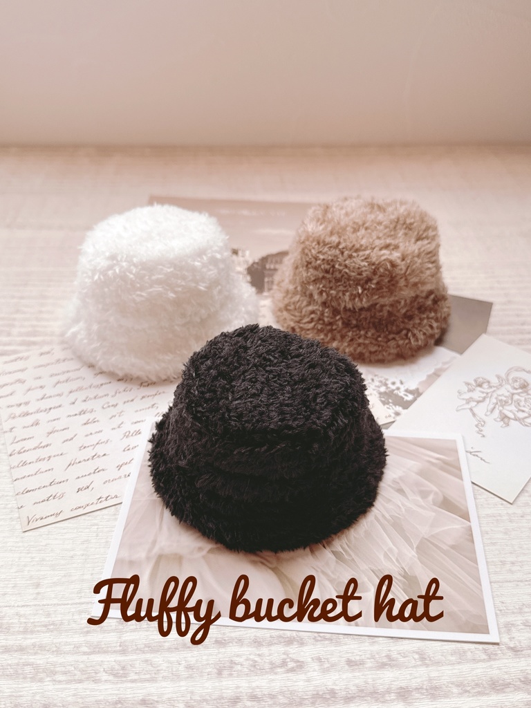 Fluffy bucket hat with earmuffs