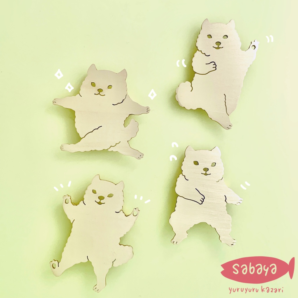 おどる犬のブローチ