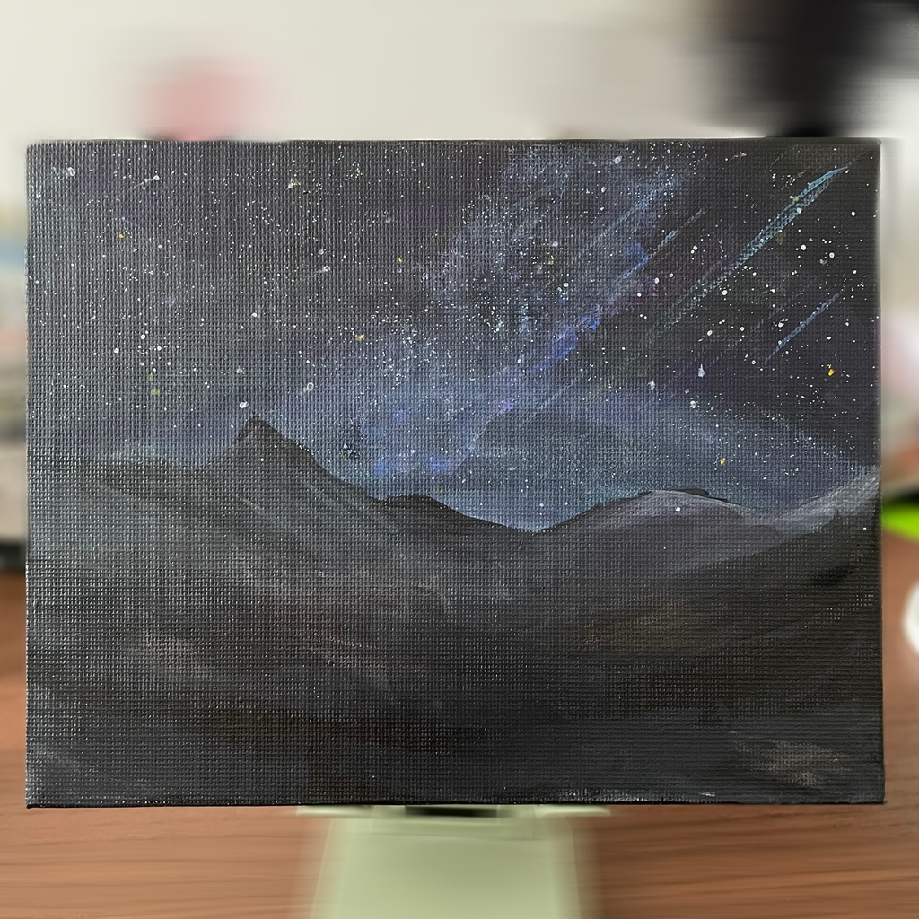 夜空と山の絵画