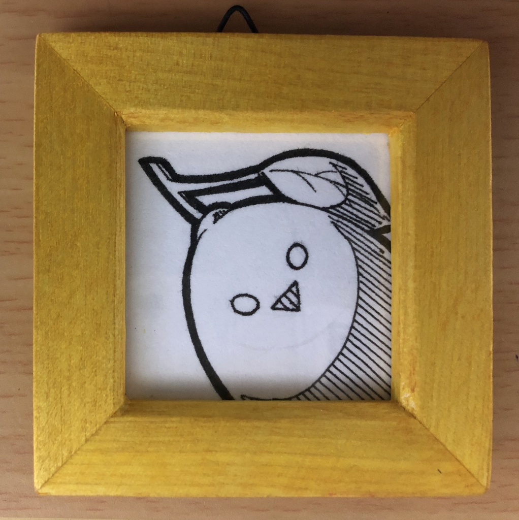 何か言いたそうな顔でこちらを見つめているミニ原画