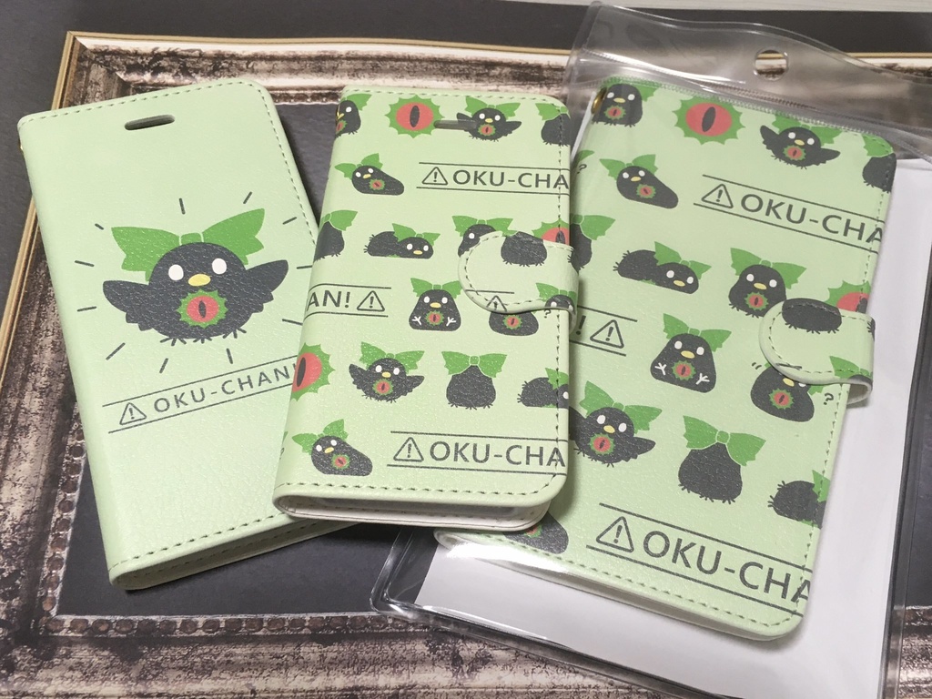 【受注生産】おくうちゃん 手帳型スマホケース(総柄)