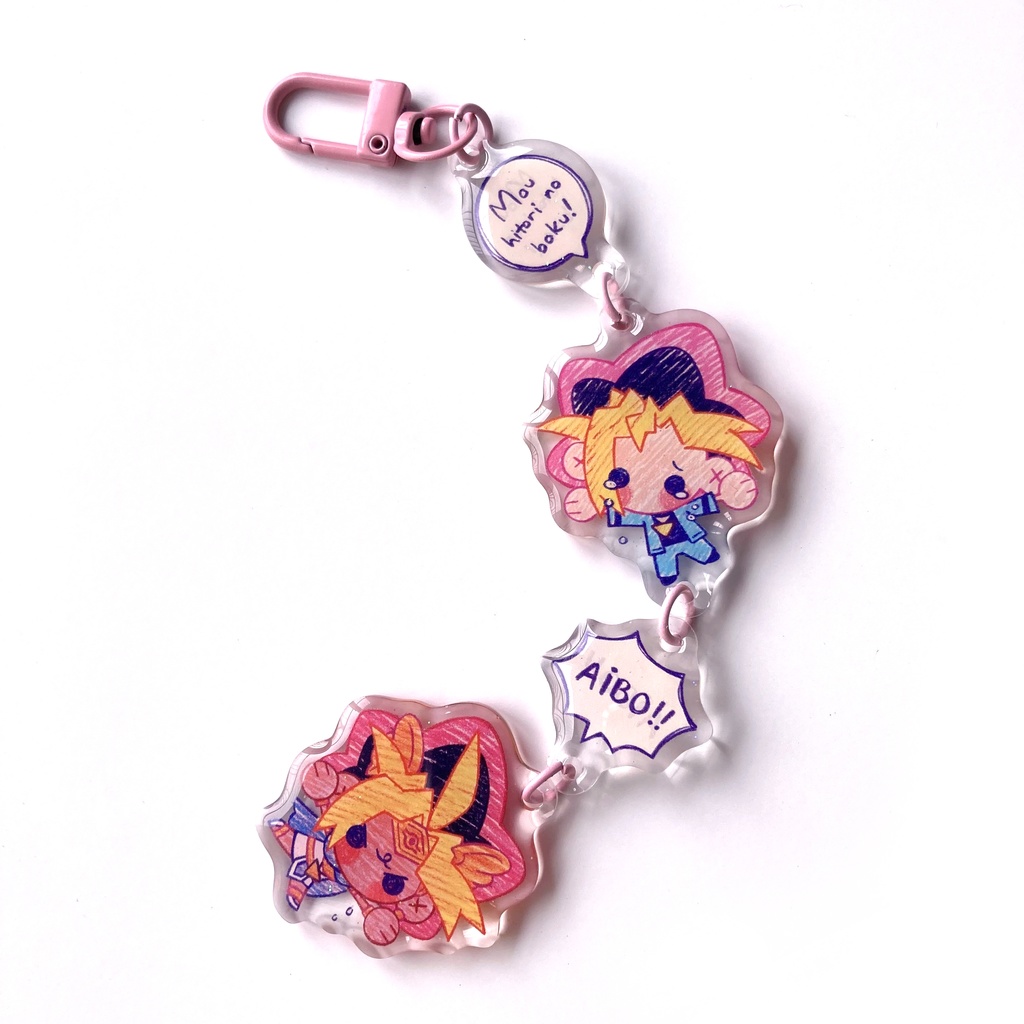 Atem and Yugi linking keychain