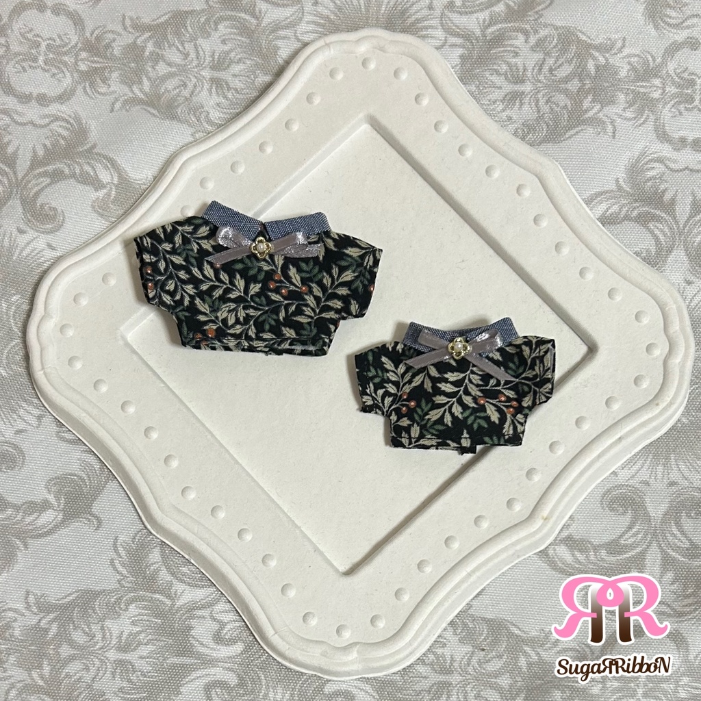 柊木柄のシャツ