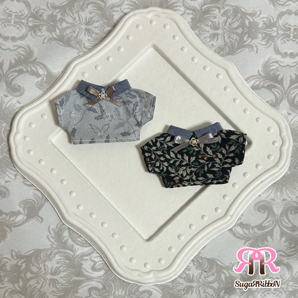 柊木柄のシャツ