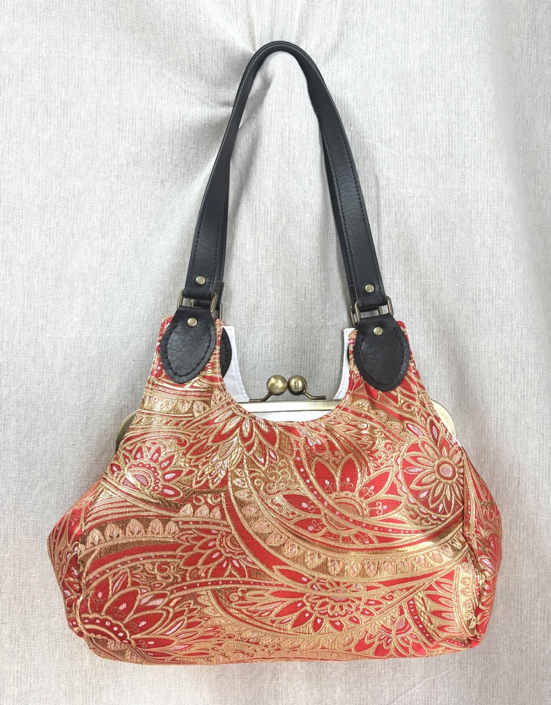 カリム概念がま口俵形バッグ