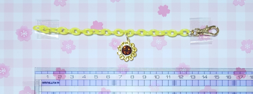 キラキラひまわりのポシェット風チャーム