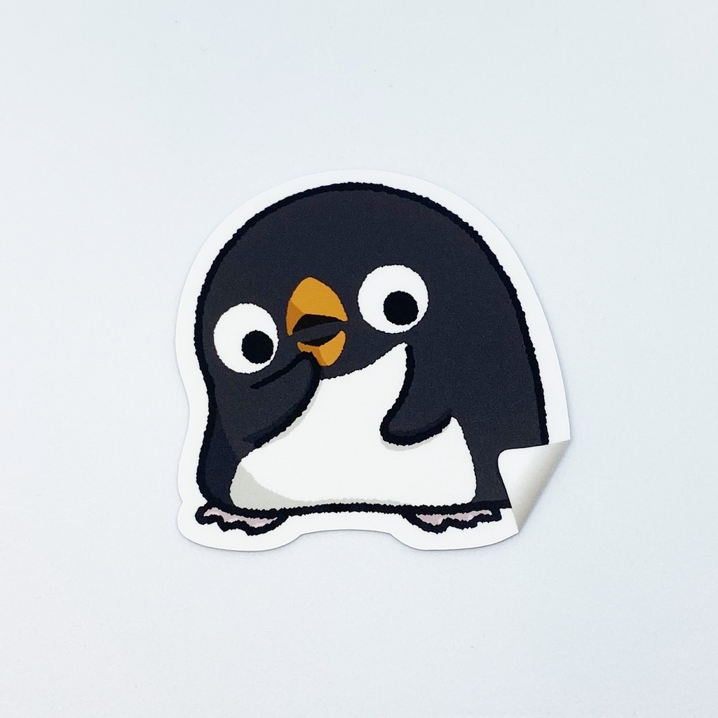 剥がれかけのオソラクペンギンステッカー