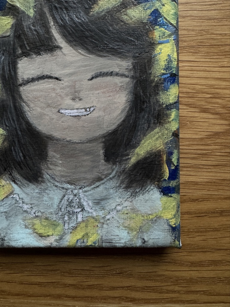 《はにかみ》“She smiled shyly”