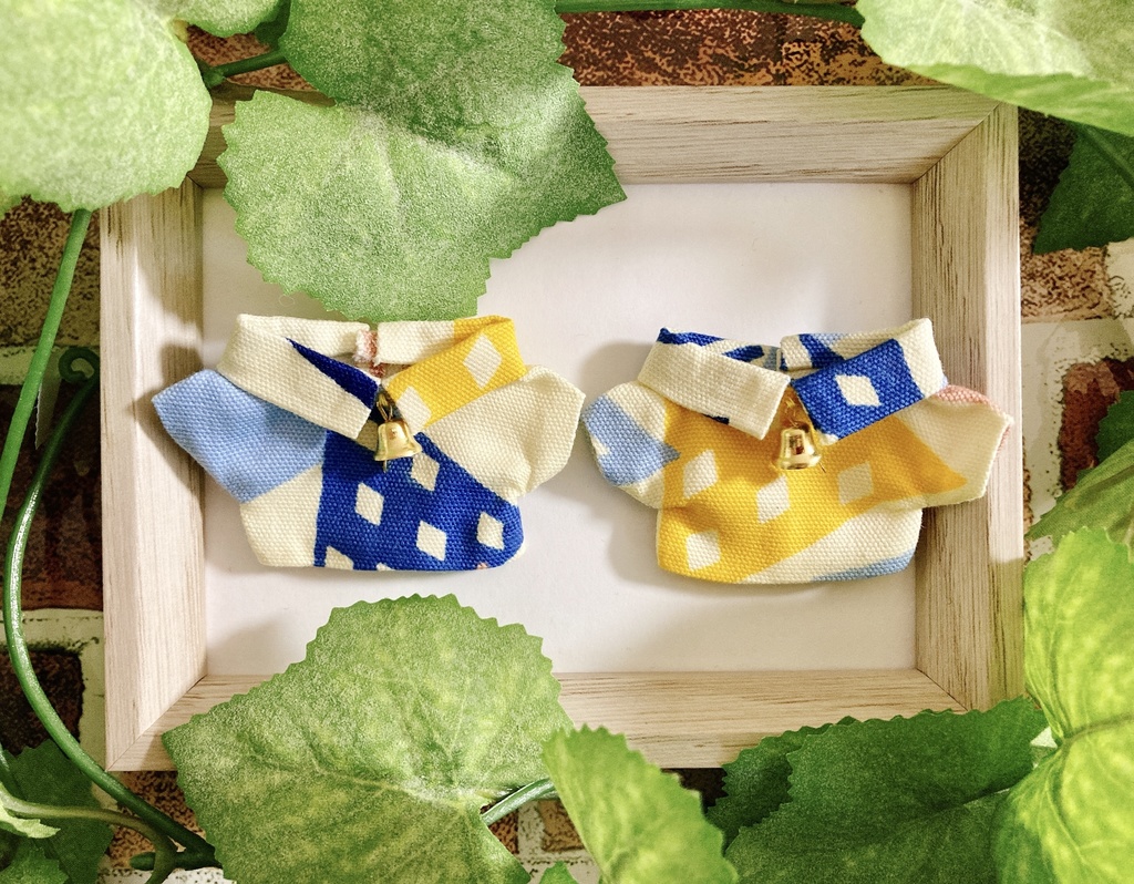 ベル付きのシャツ