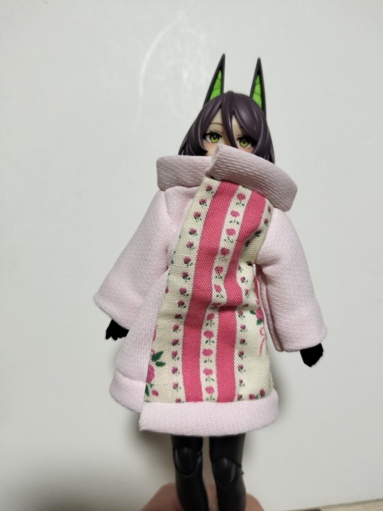 ピンクの柄の上着
