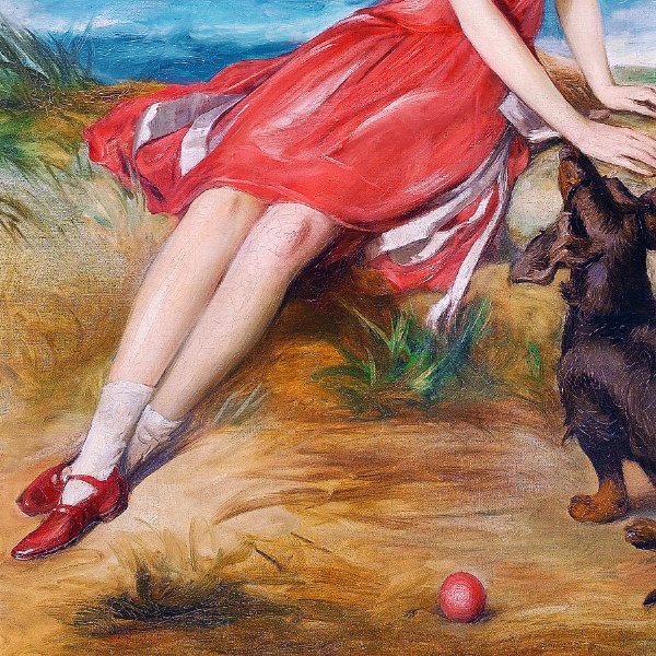 海辺で犬と一緒の赤いドレスの少女