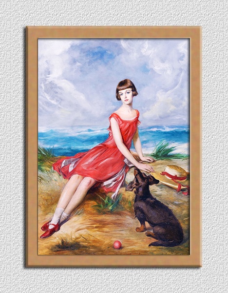 海辺で犬と一緒の赤いドレスの少女