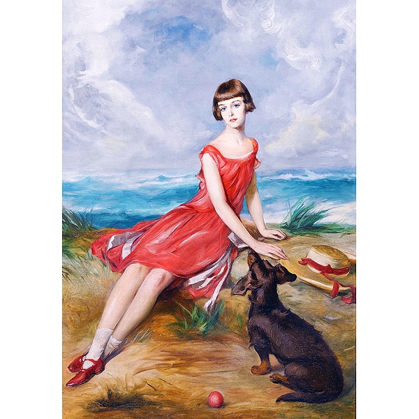 海辺で犬と一緒の赤いドレスの少女