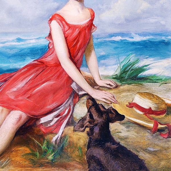 海辺で犬と一緒の赤いドレスの少女