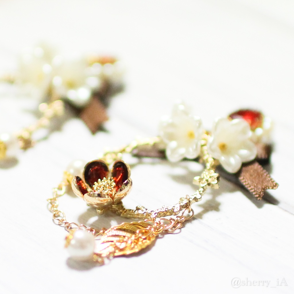 祝福と華やかな梅の耳飾り