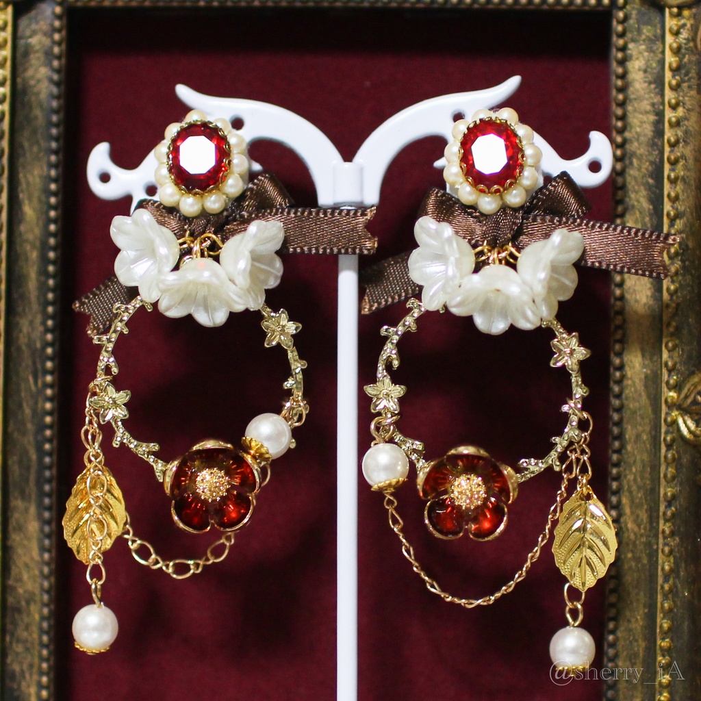 祝福と華やかな梅の耳飾り